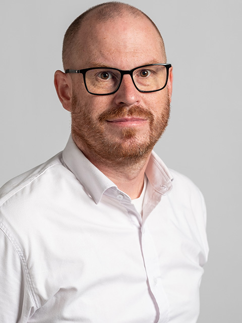 portrait photograph of staff member, David Galibourg